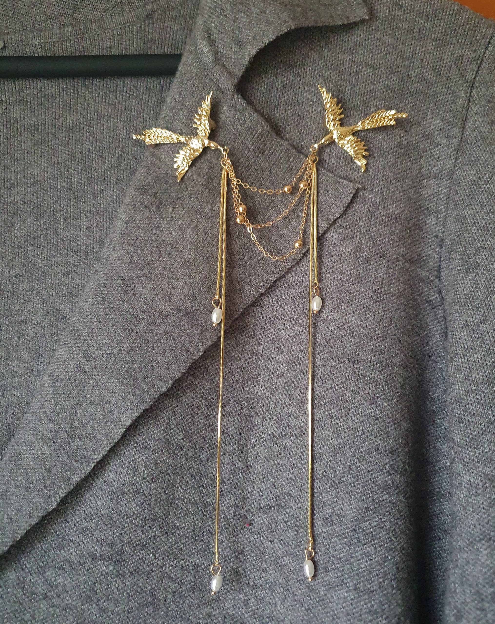 Elegant twin bird brooch